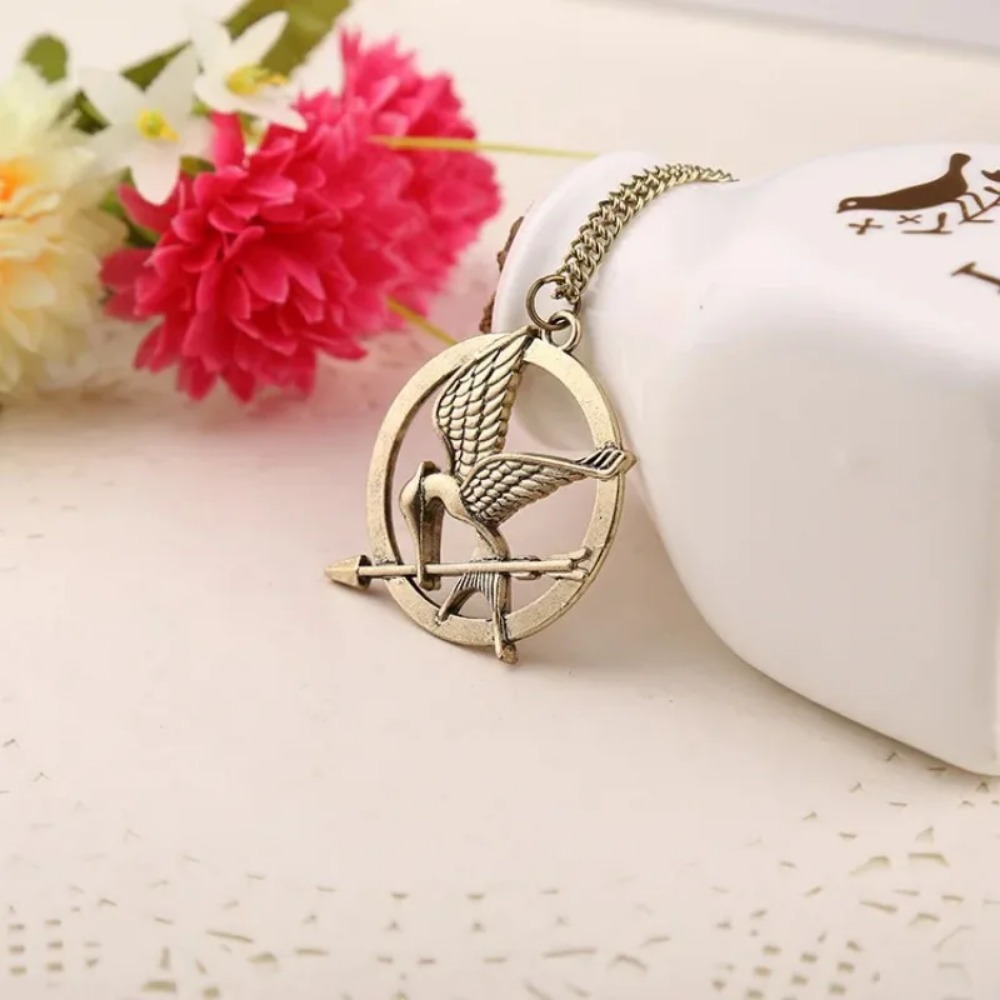 Collier d'oiseau Hunger Games  - Party Games Simple avis et prix