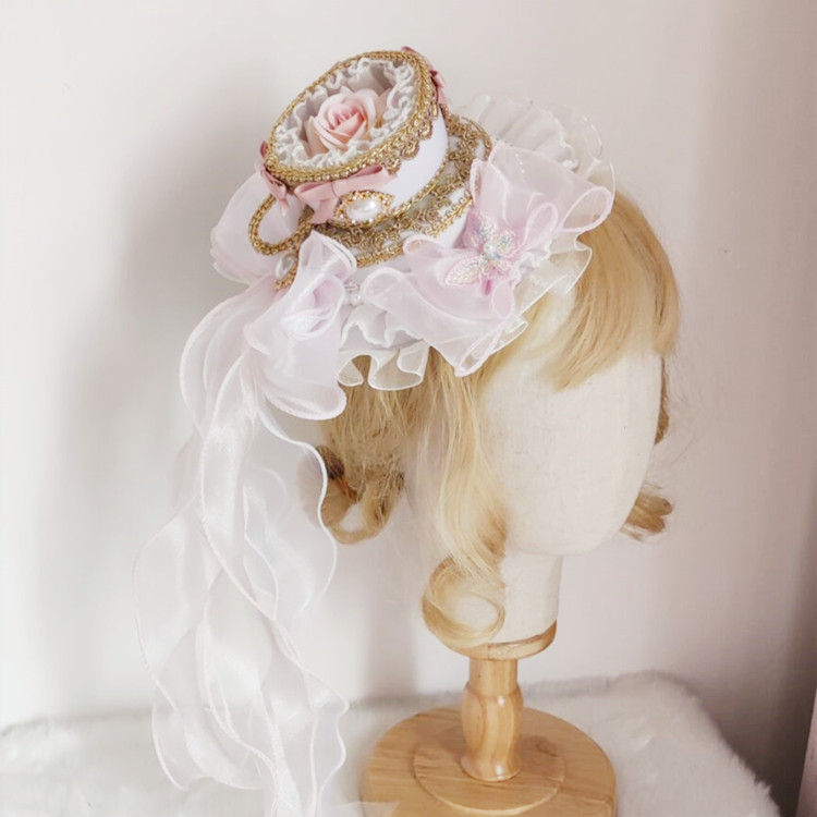 Coiffure de fête de thé Lolita - Party Games In Spanish avis et prix